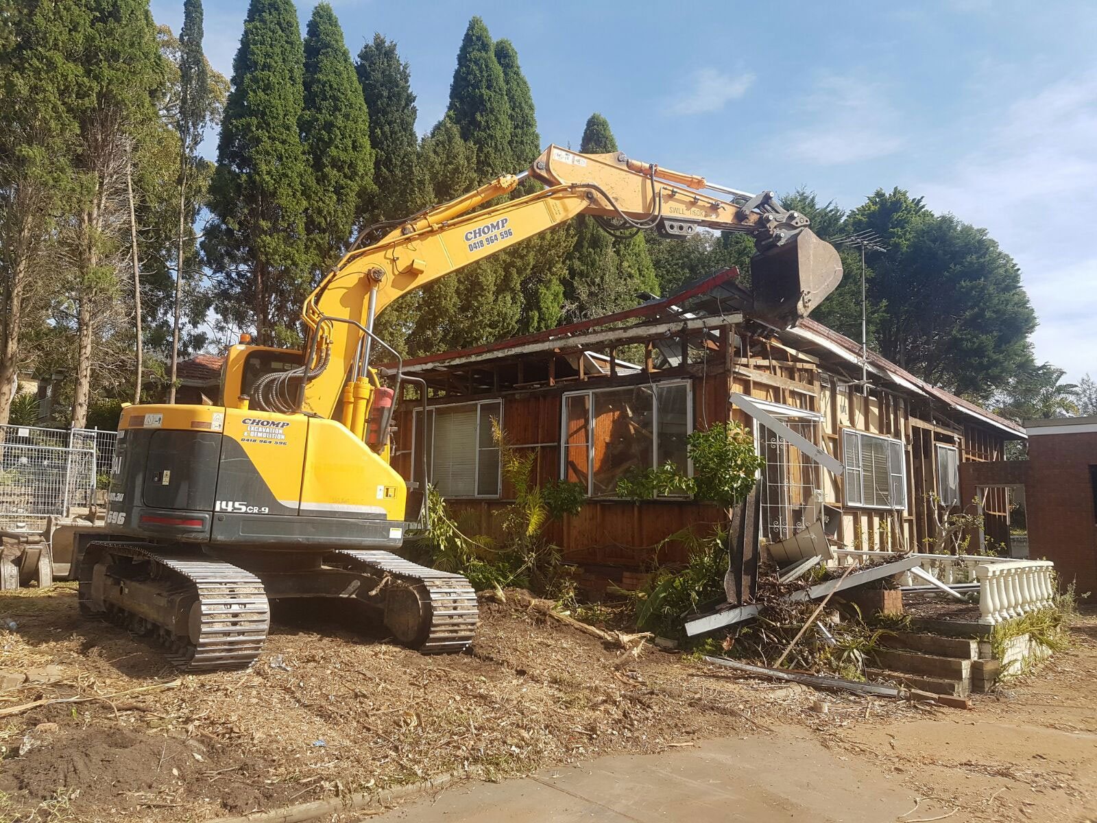 Residential Demolition Chomp Excavation & Demolition